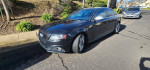 2011 Audi S4 Prestige in black parked on the street, showcasing sleek design and luxury features.