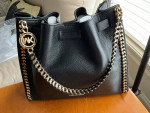 MK black leather shoulder bag